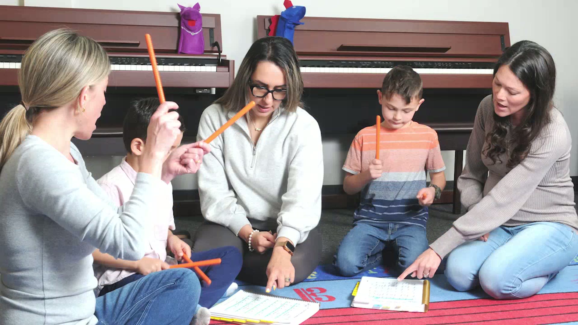 Young children in an MYC music lesson